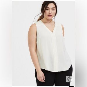 Charmeuse sleeveless blouse.